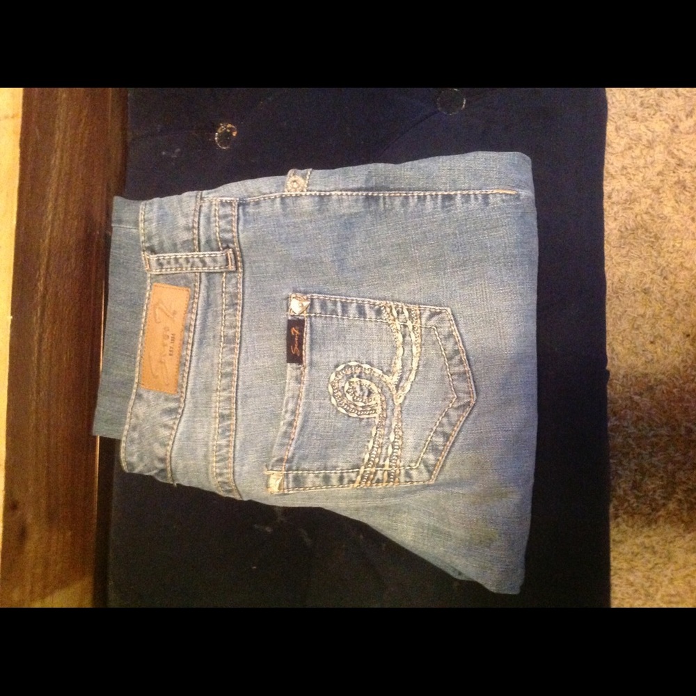 Light blue with design pocket  gently used jeans
